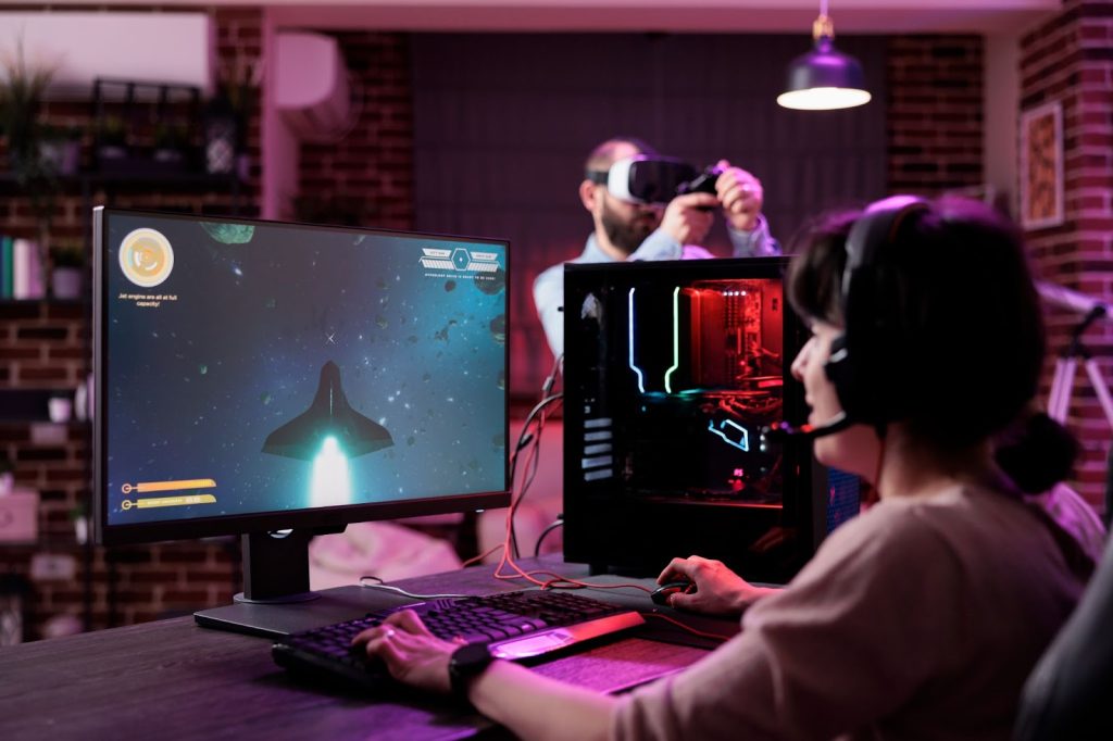 modern player live streaming video games play computer having fun with rpg tournament young adult playing online action shooting game with multiple players pc shooter challenge