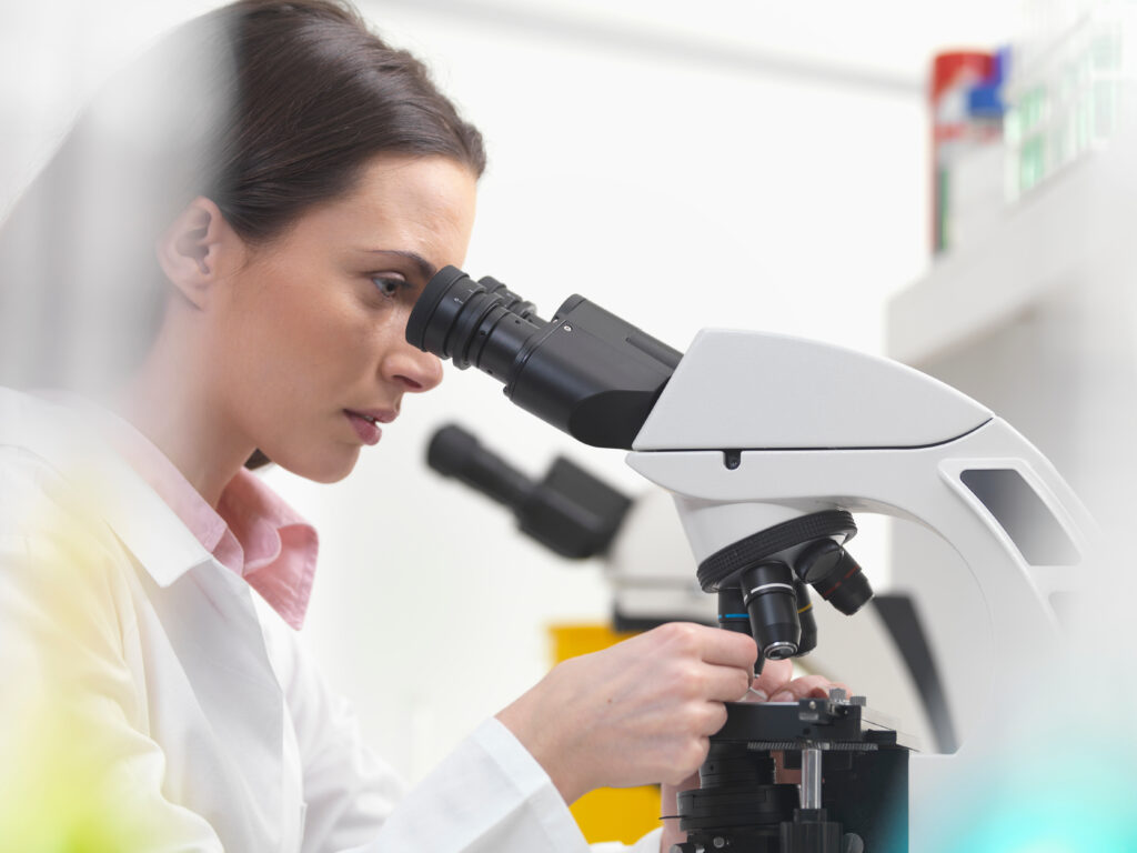 scientist using microscope in lab 2023 11 27 05 11 53 utc 1